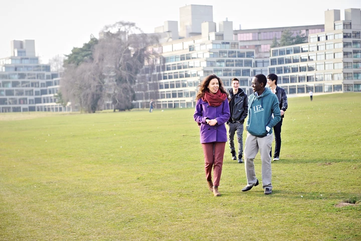 INTO UEA Students Walking In Front Of Ziggurats 20294