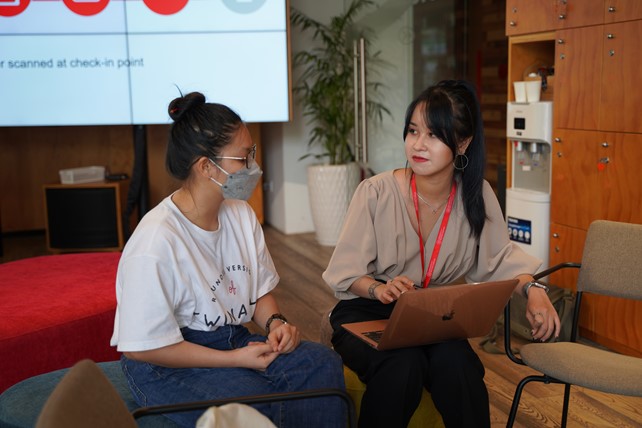Prospective international student student speaks with counselor at INTO University Access Centre in Ho Chi Minh City, Vietnam.